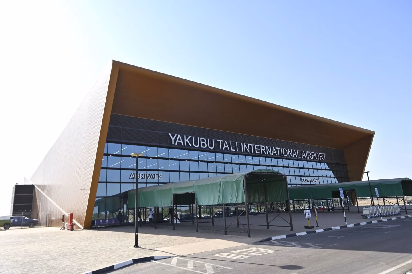 The terminal of Yakubu Tali International Airport, Tamale, with its name on the facade